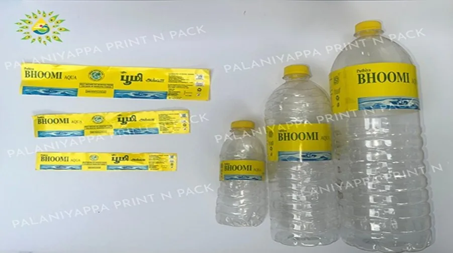 Water bottles with printed labels and matching loose labels.