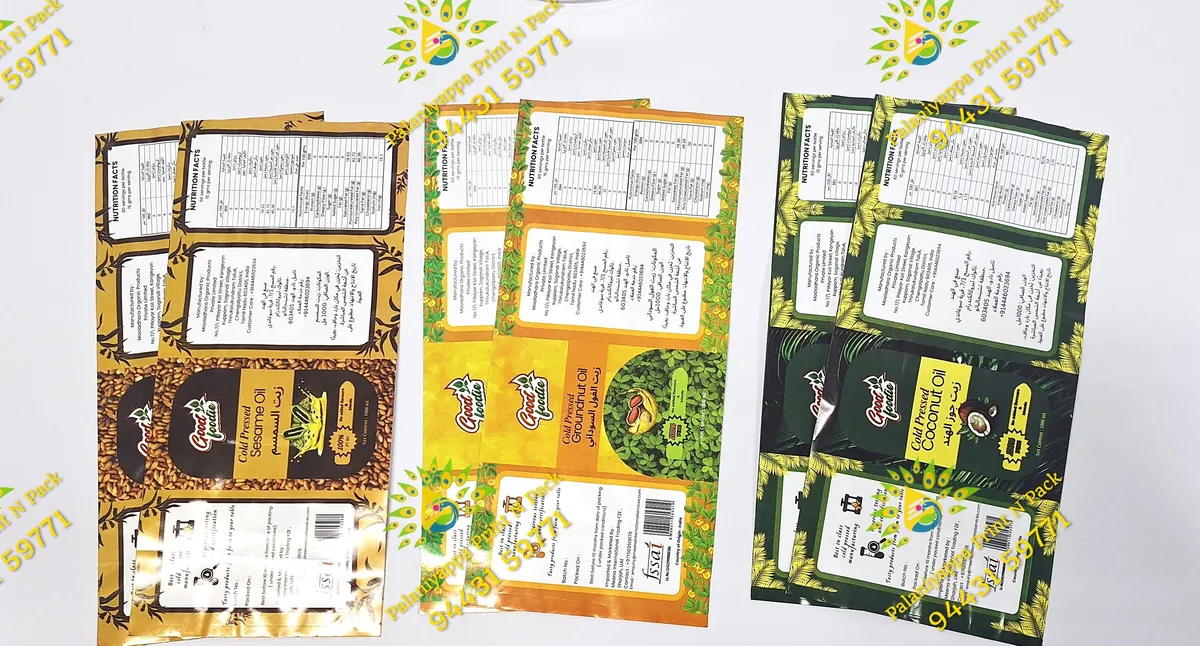 Three printed oil label designs in brown, orange and green.