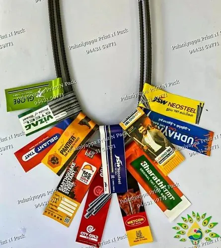 Printed tags fanned below a U-shaped steel bar, on white