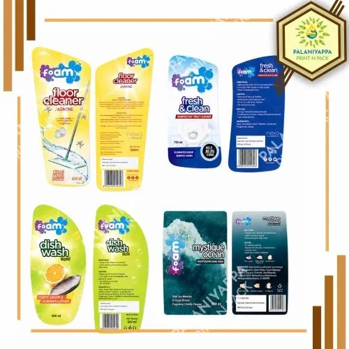 Printed cleaning product bottle labels laid flat
