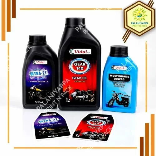 Three engine and gear oil bottles with printed labels