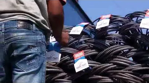 Corporate video: tags on bundles of steel bars